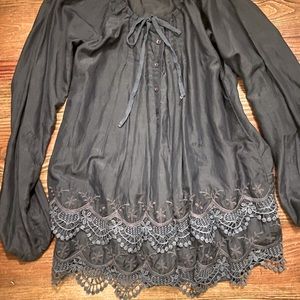 Beautiful lace detail top. Worn once.